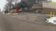 Body found after Akron shed fire behind vacant building