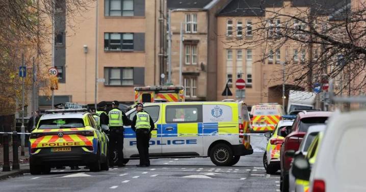 Glasgow street locked down as police swarm after woman heard 'screaming'