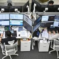 Markets mostly up as traders prepare for expected US rate cut