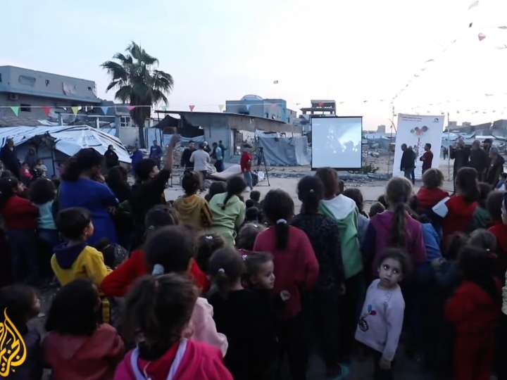 Makeshift movie screenings in Gaza City bring children ‘out of the ruin’