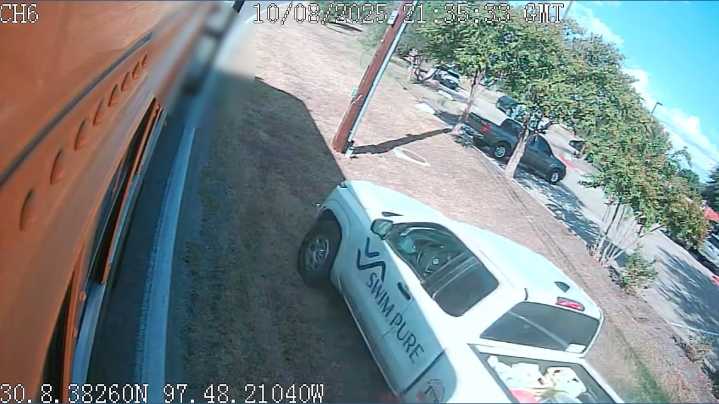 Austin driver arrested, charged after nearly hitting child getting off AISD school bus