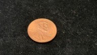 Final pennies go to auction for tens of thousands