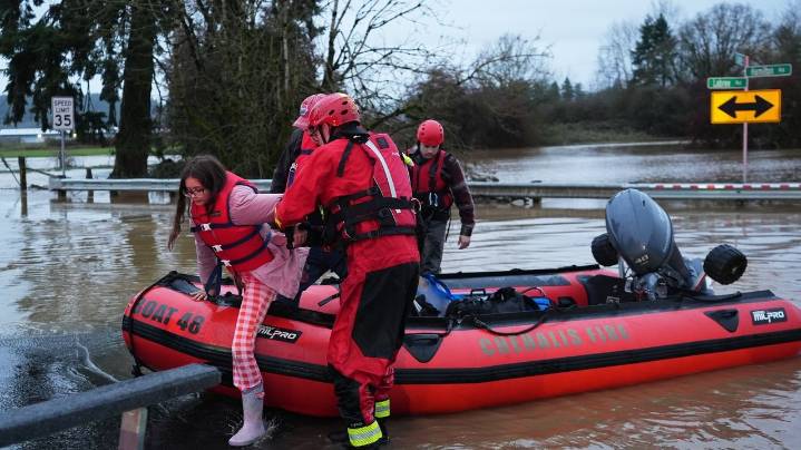 Storms bring heavy rain to the Pacific Northwest, snow and freezing rain to the Upper Midwest