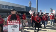 Las Vegas airport workers hold 24