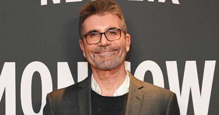 Simon Cowell's new boyband pose together in first photo