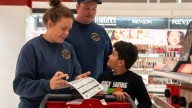 See Des Moines Police and Fire take local children Christmas shopping
