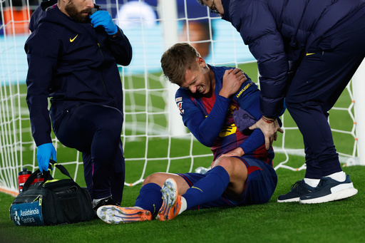 Dani Olmo scores and gets injured as Barcelona beats Atletico Madrid 3