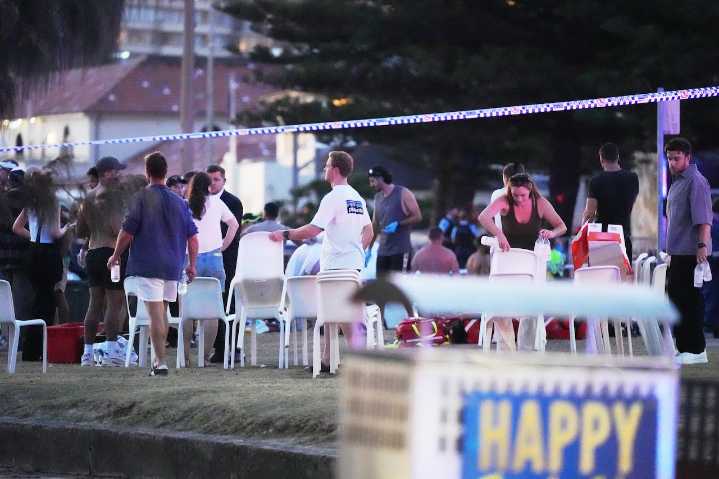 Gunmen kill at least 11 people in attack on Jewish holiday event at Australian beach
