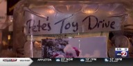 Neenah Army Reserve helping Oshkosh bar distribute toys from their toy drive