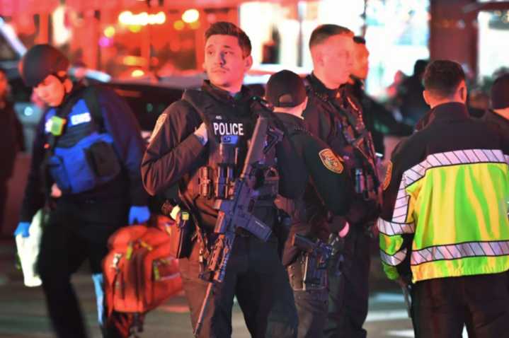 At least 2 dead, 9 wounded in Brown University campus mass shooting, police hunt for gunman