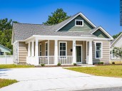 Home prices are poised to dip in 22 U.S. cities next year, a new analysis says. See where.