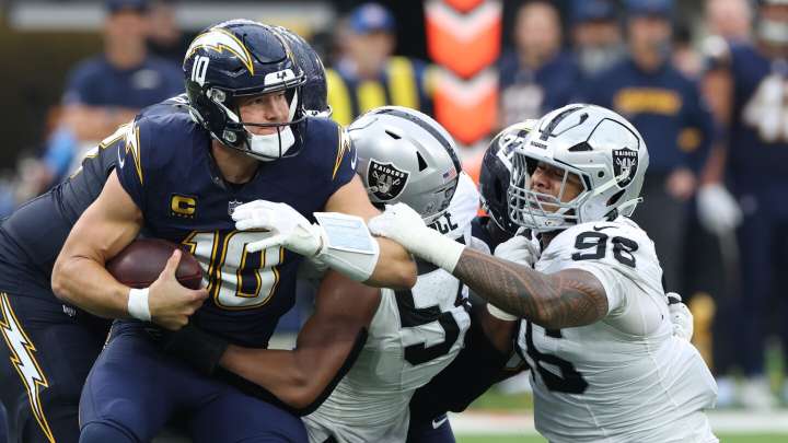 Justin Herbert underwent surgery on his left hand Monday