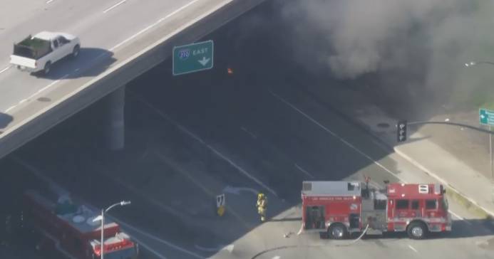 Electric school bus catches fire, burns on Los Angeles streets
