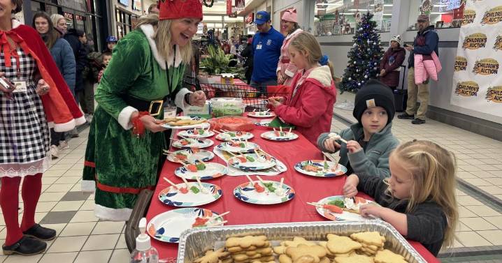 Weather can't stop the holiday fun at Children's Auction Family Night