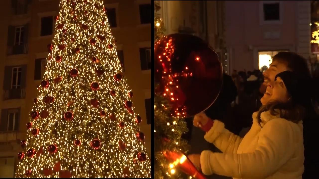 Festive cheer in Rome as tree and decorations light up historic center for Christmas