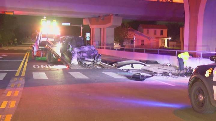 Man rescued after being pinned in overnight crash near downtown, officials say