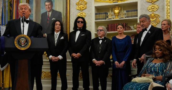 Trump awards medals to the Kennedy Center honorees in an Oval Office ceremony