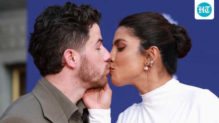 Priyanka Chopra kisses Nick Jonas as Jonas Brothers gets honoured at TCL Theatre