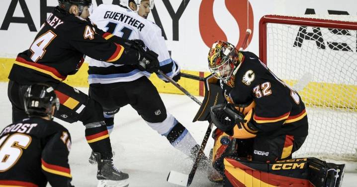 Wolf's 28-save shutout leads Calgary Flames to 2