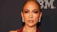 Jennifer Lopez poses with 2 rarely-seen sisters at mother's 80th birthday party