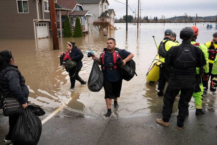 Torrential rains unleash widespread flooding, evacuations in Pacific Northwest