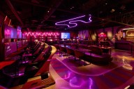 The hottest club in RiNo is filled with Formula 1 racing simulators