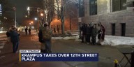 Krampus visits downtown Sioux Falls for holiday photos