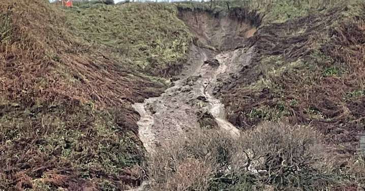 Landslide at Welsh beach as mud cascades down cliff