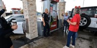 Sarasota Police officers fill tanks on Giving Tuesday, inspiring community kindness