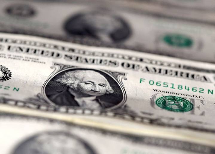 Dollar staggers to third straight weekly drop as investors ponder Fed outlook