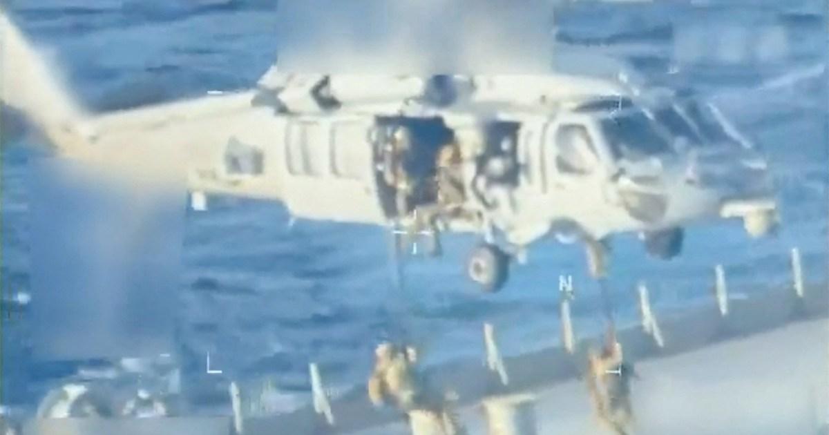 Moment US gun squads seize 'largest ever' oil tanker from Venezuela