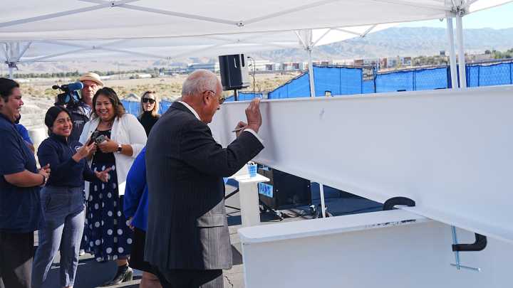 Beam signing event for CSUSB PD Student Success Center building