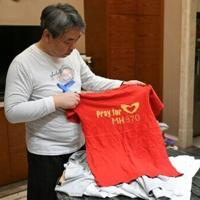 Son of MH370 flight victim seeks answers after 11 years