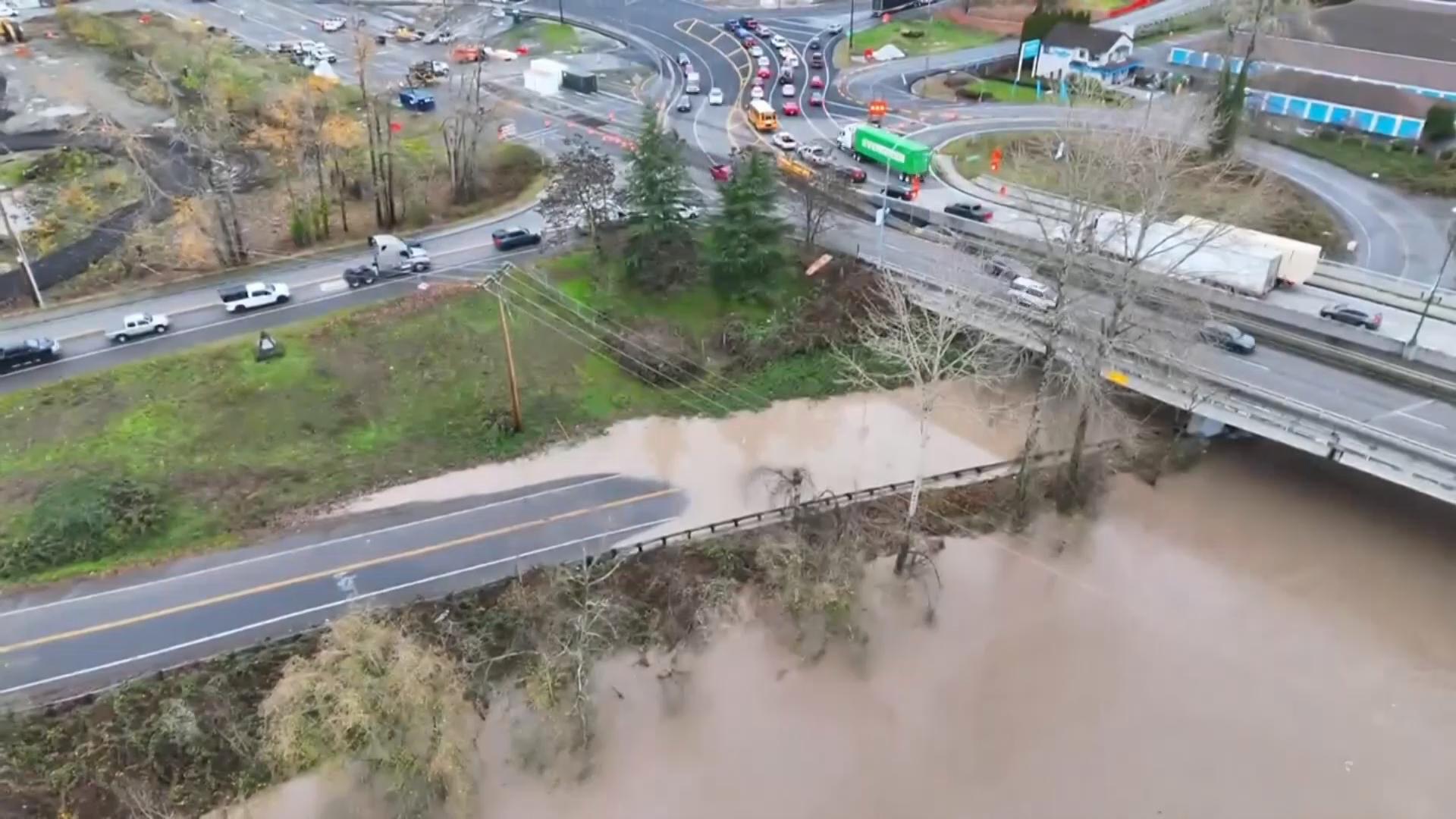 Record flooding threatens Washington as more heavy rain pounds the Northwest