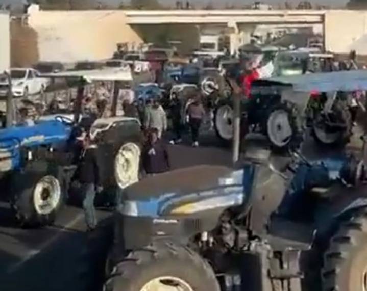 Farmers block Mexico's Congress with tractors in protest against new national water law proposal