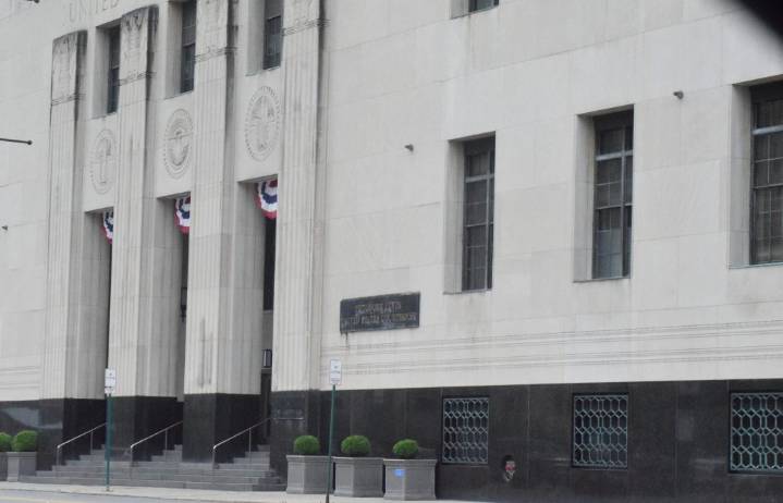 Plea hearing pushed back for former Macomb County car salesman