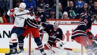 Hellebuyck makes 24 saves in return from knee injury, Jets beat Capitals 5