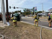 Crews on scene of log truck rollover at US 1 and CR 108 in Nassau County