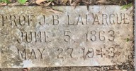 Why did filmmaker Ken Burns travel to Alexandria in 2023 to learn about a man named J.B. Lafargue?