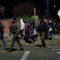 Police hunt gunman who killed two at US university