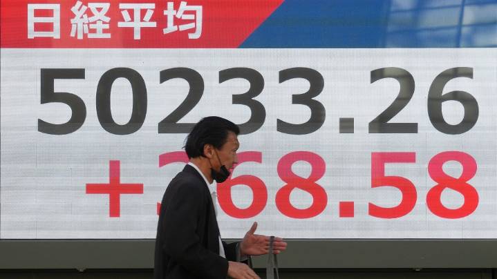 Asian shares are mixed after Wall Street pulls near its all
