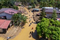 Indonesian villages flattened by catastrophic floods