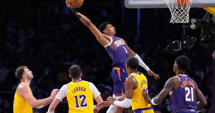 Suns snap Lakers' 7-game winning streak with 125-108 victory despite Booker's early exit