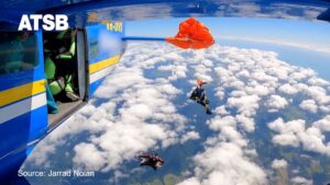 Video shows terrifying moments skydiver’s parachute became caught on plane tail 15,000 feet in the air