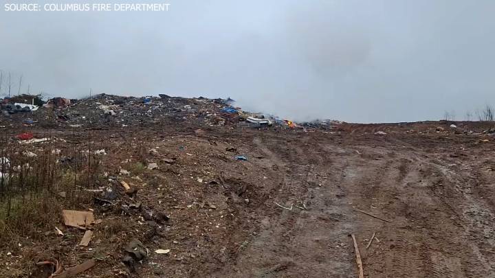 Rain extinguished most of the flames at the landfill