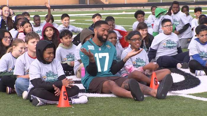 From footwork to finances: Elementary students get a double training day with the Jags