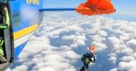 Video shows skydiver dangling from plane after parachute mishap