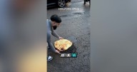 Fuming bloke uses 18-inch naan breads to cover potholes as council hits back