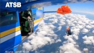 Video: Skydiver’s parachute stuck on plane 15,000 ft above ground
