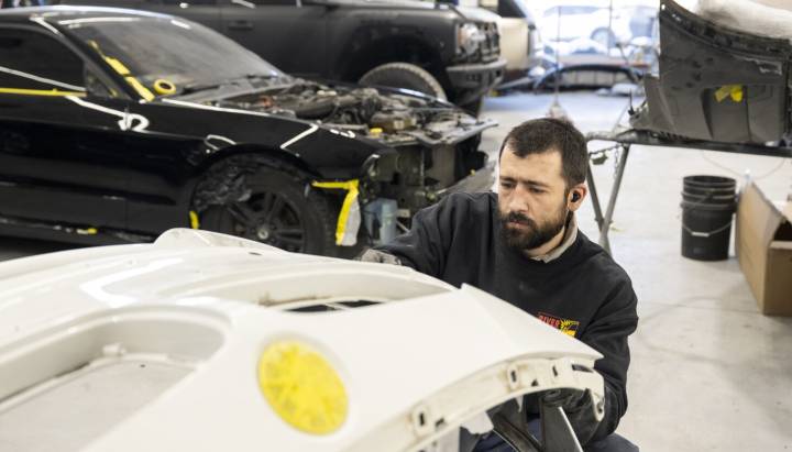 Auto body shops around Chicago are busy, and prices are up as early snow sends drivers in for repairs